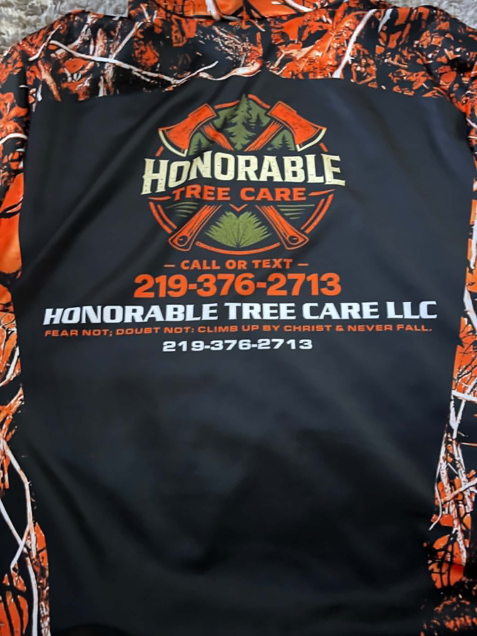 Honorable Tree Care LLC branded shirt with phone number